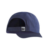 A navy blue 5-panel cap shown from a rear three-quarter view, featuring a dark navy adjustable strap with a small silver metal 'M' logo on a white background.
