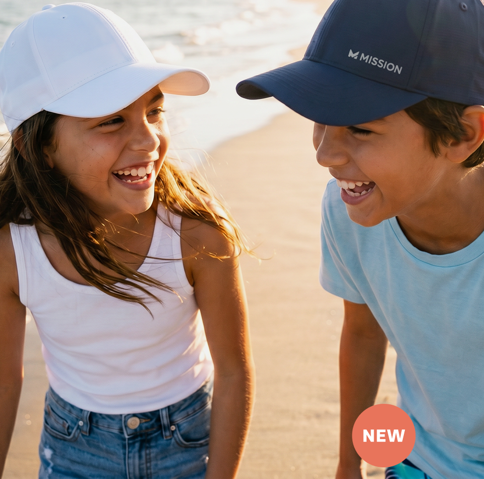 2 kids wearing Mission Kids Performance Cooling Hats
